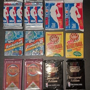 Unopened basketball card packs set aside for a photo